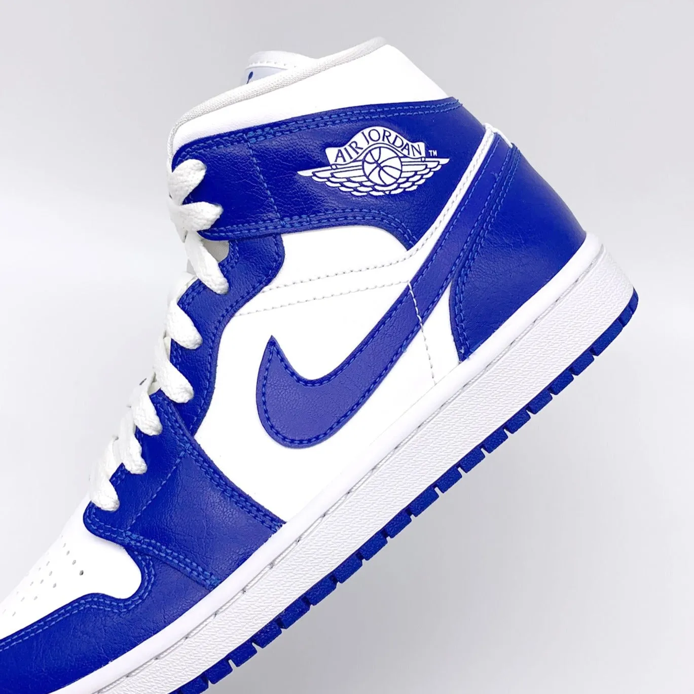 Jordan 1 Mid Kentucky Blue